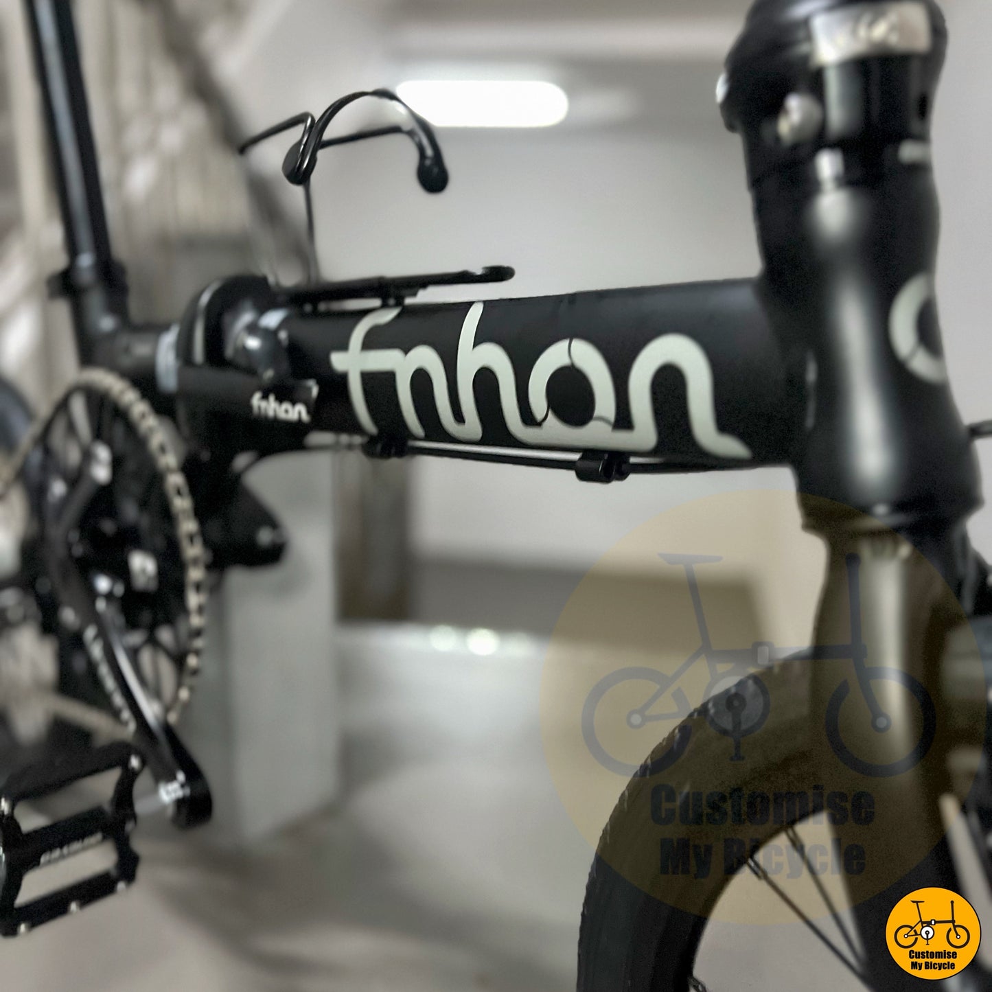 close-up of Fnhon logo on Freedom model frame