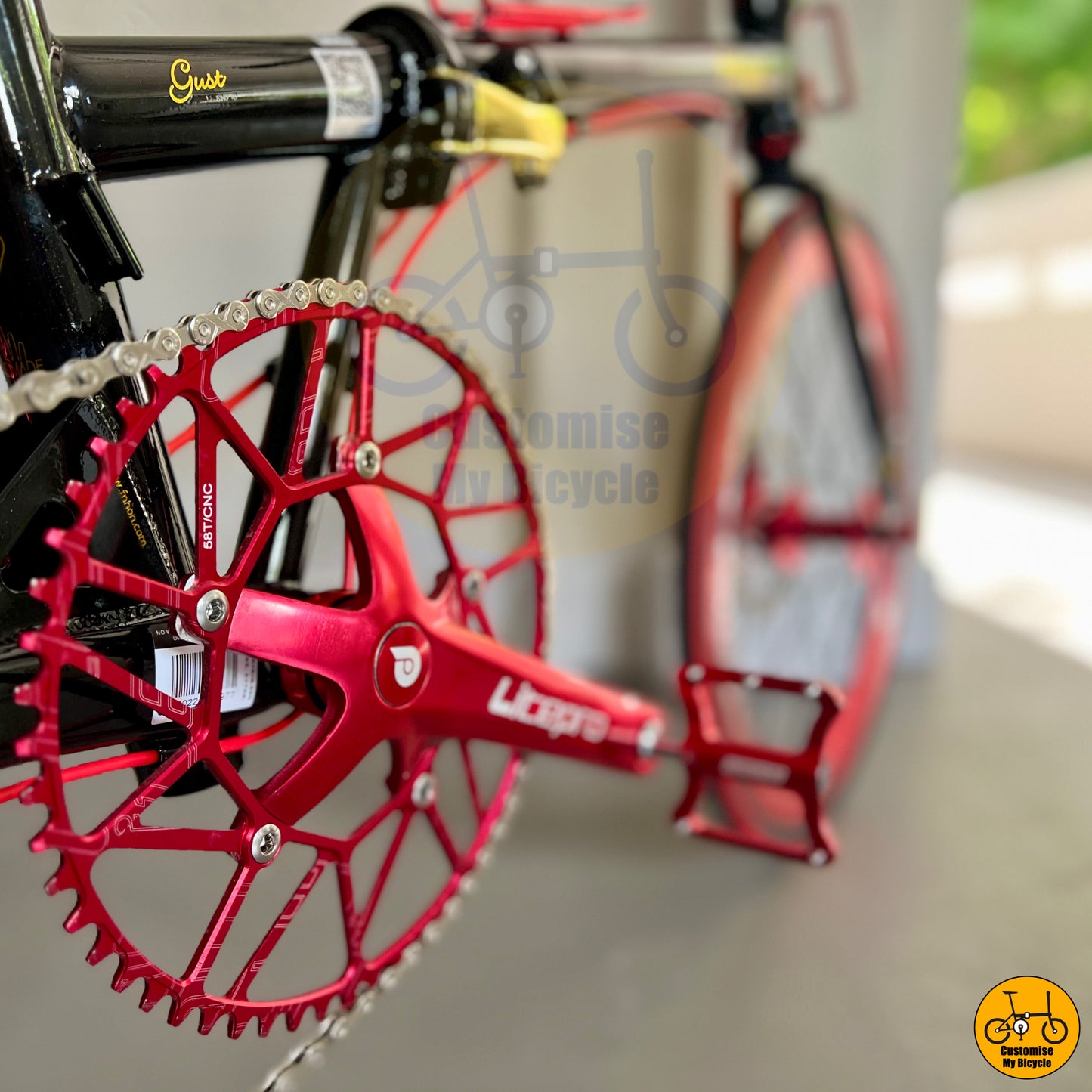 Gold-accented chainring enhancing the premium aesthetic of the bike