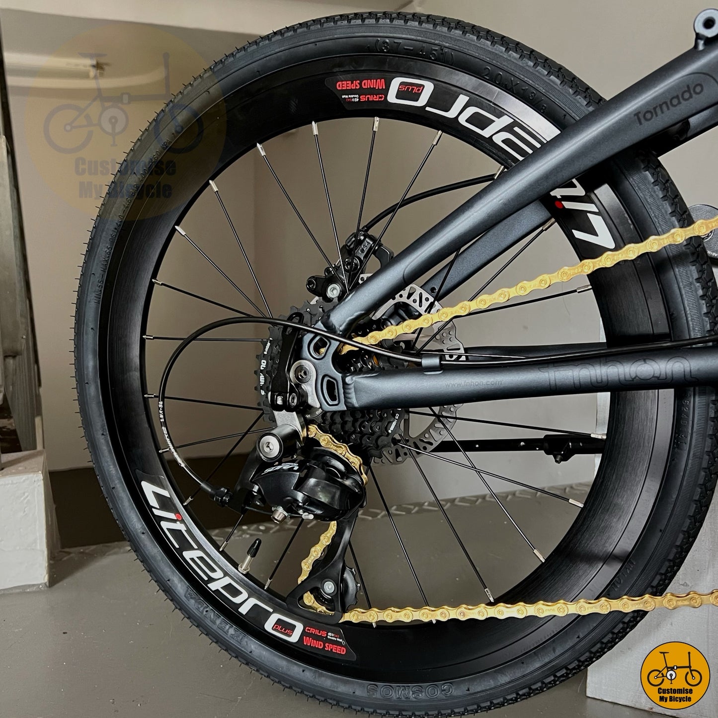 Shimano Sora 9 gears on Fnhon Tornado 22-Inch Folding Bike β Dark Teal Blue