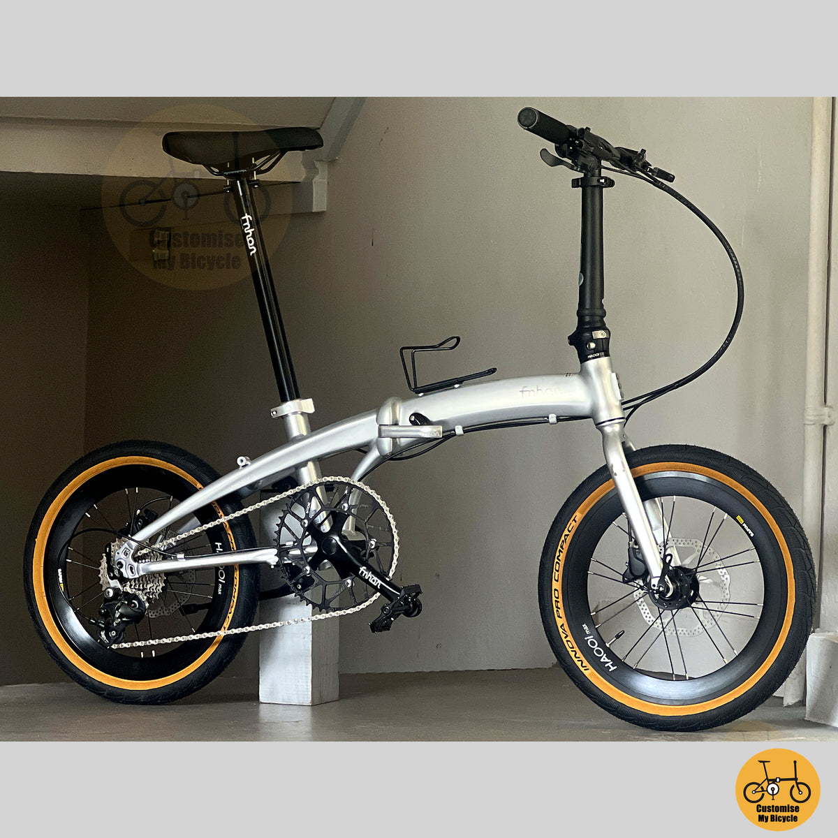 Fnhon Twister 18" Space Silver folding bike in compact folded configuration