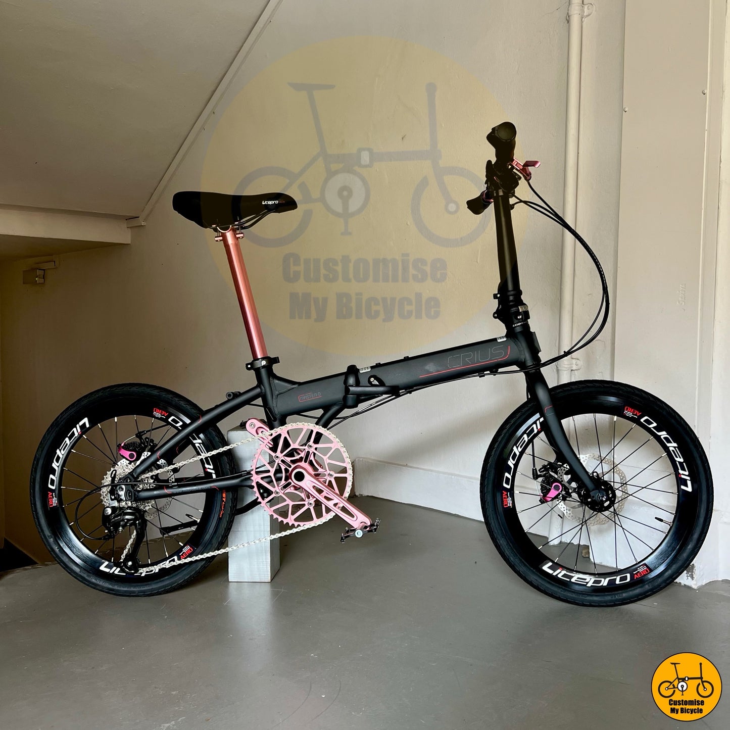 Shimano 9-speed pink foldie with aero wheels and lightweight Litepro build for stylish riders
