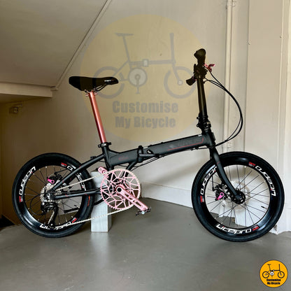 Shimano 9-speed pink foldie with aero wheels and lightweight Litepro build for stylish riders
