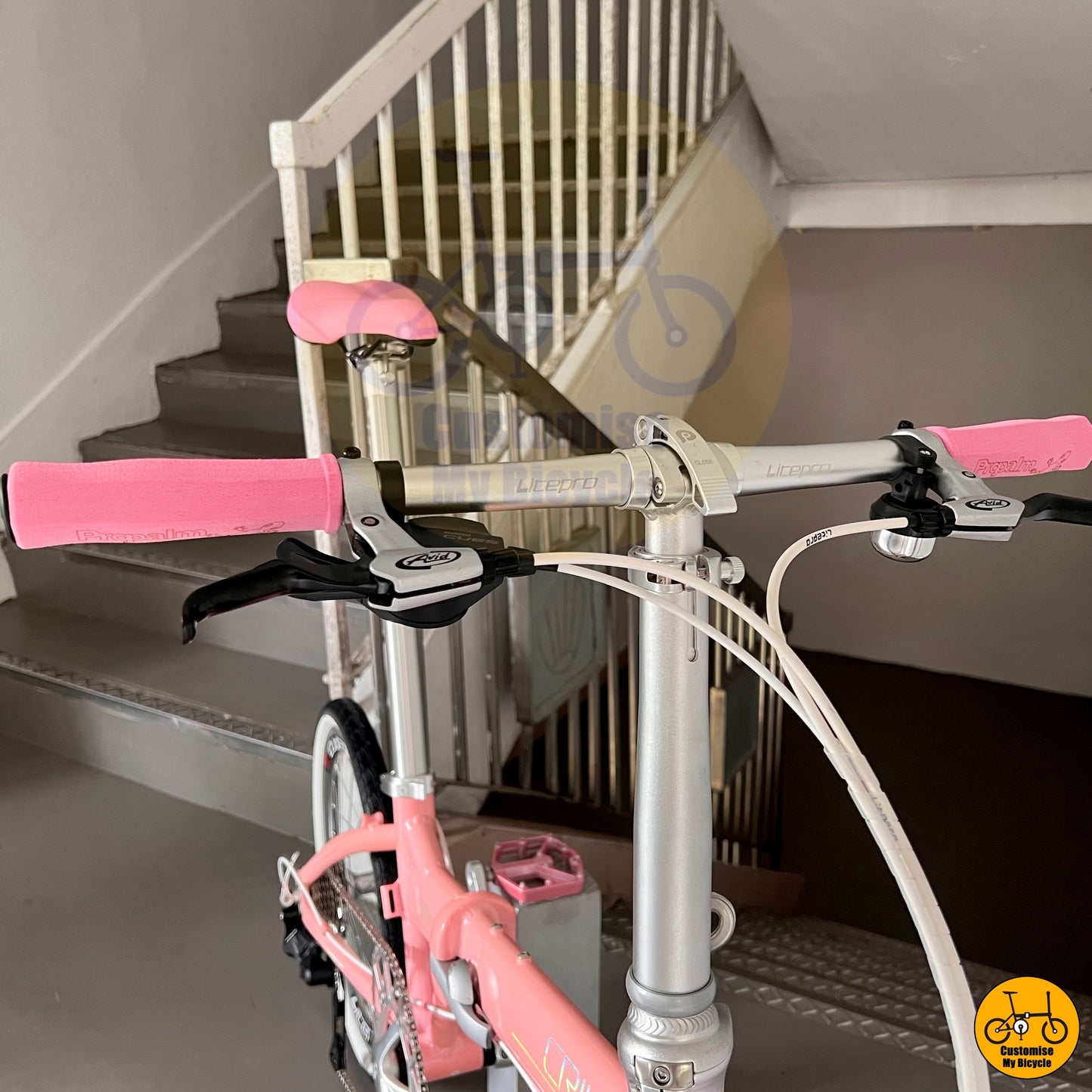 Pink Handgrips on Affordable Crius Master 22-Inch Foldable Bike – A High-Quality Alternative to Liaoge
