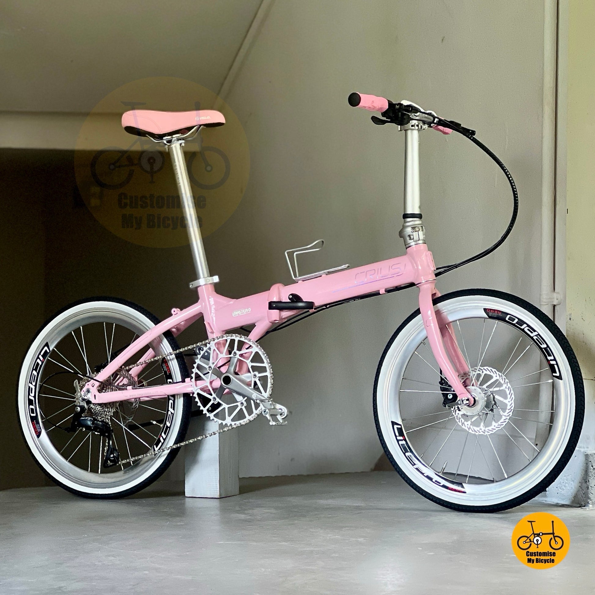 Sepeda Lipat Crius Master 22 Inci Warna Baby Pink Shimano 9 Kecepatan
