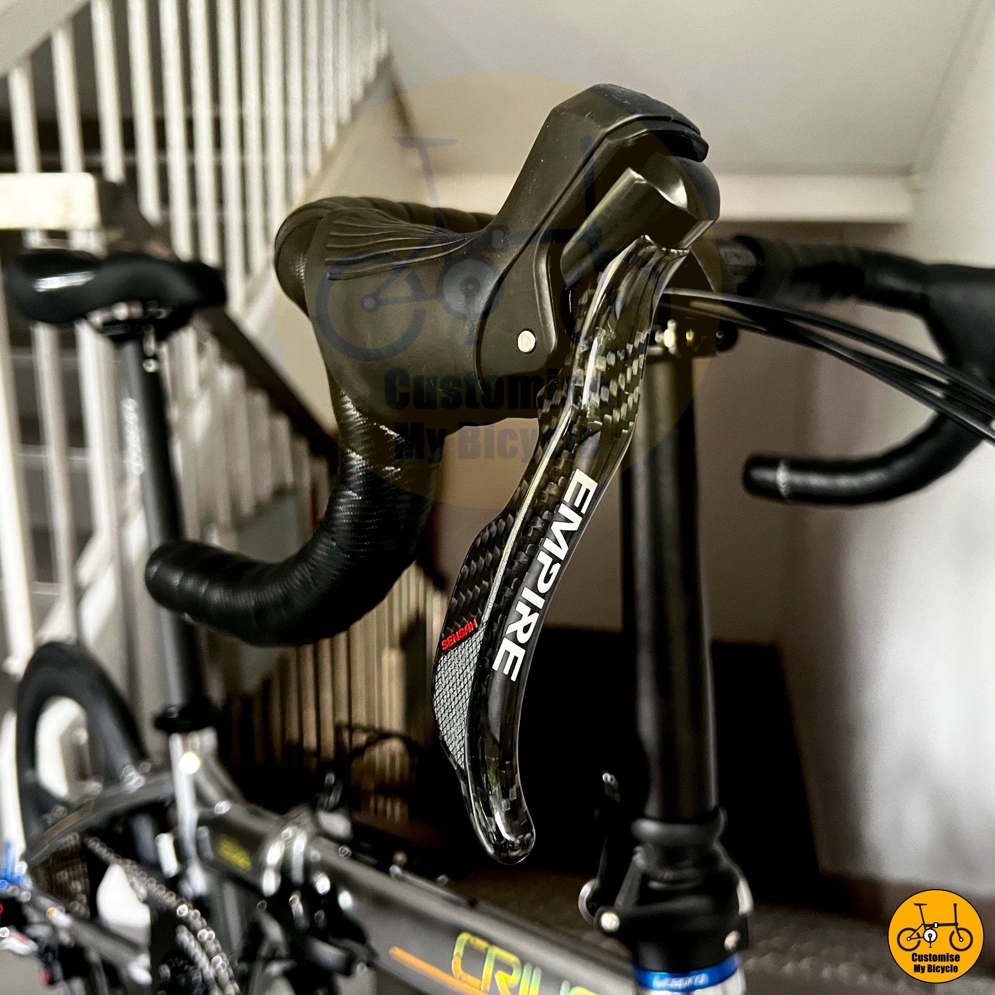 Carbon Handshifter on Chrome Silver Crius Master 22-Inch Folding Bike – A Sleek & Compact Ride for Road Cycling Enthusiasts
