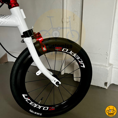 White Crius Trifold 18-inch folding bike with red accent details
