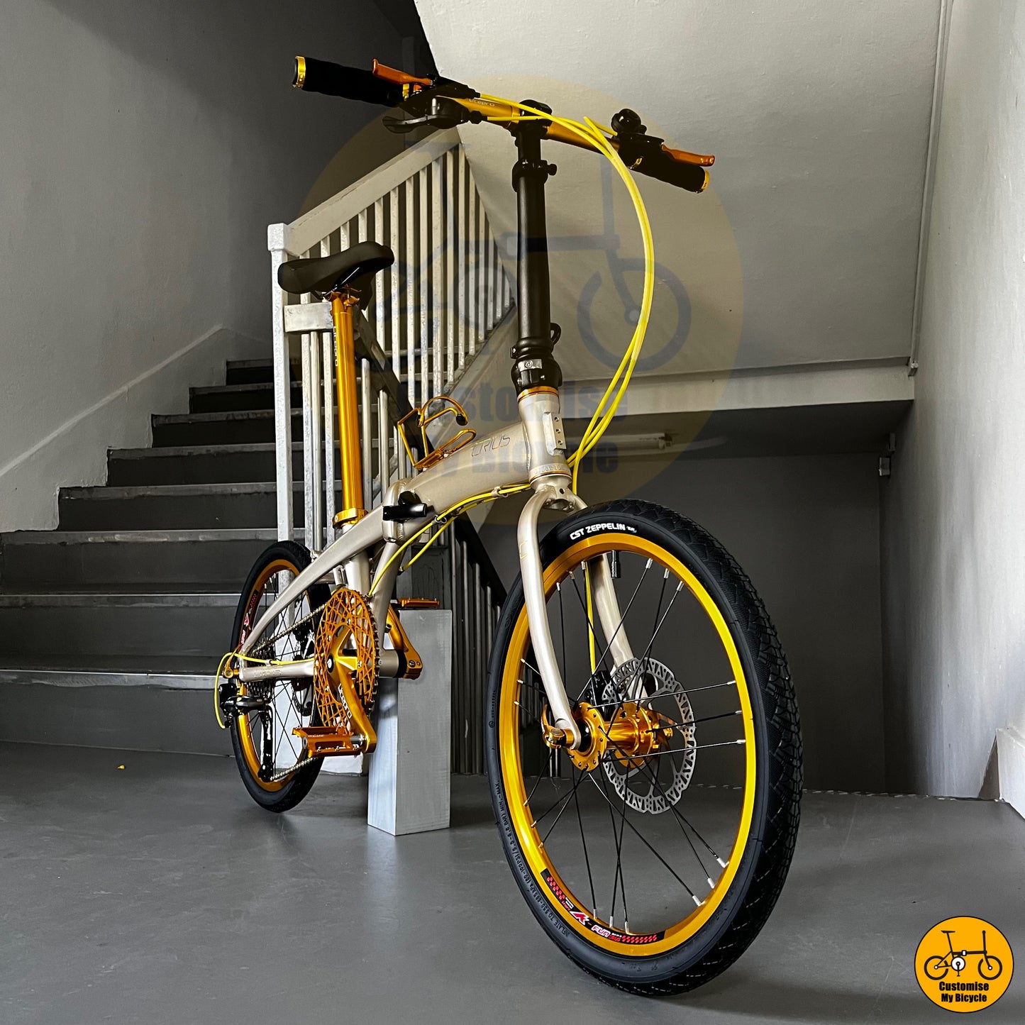Compact and lightweight Crius Velocity 22-inch foldable bicycle with a premium gold finish