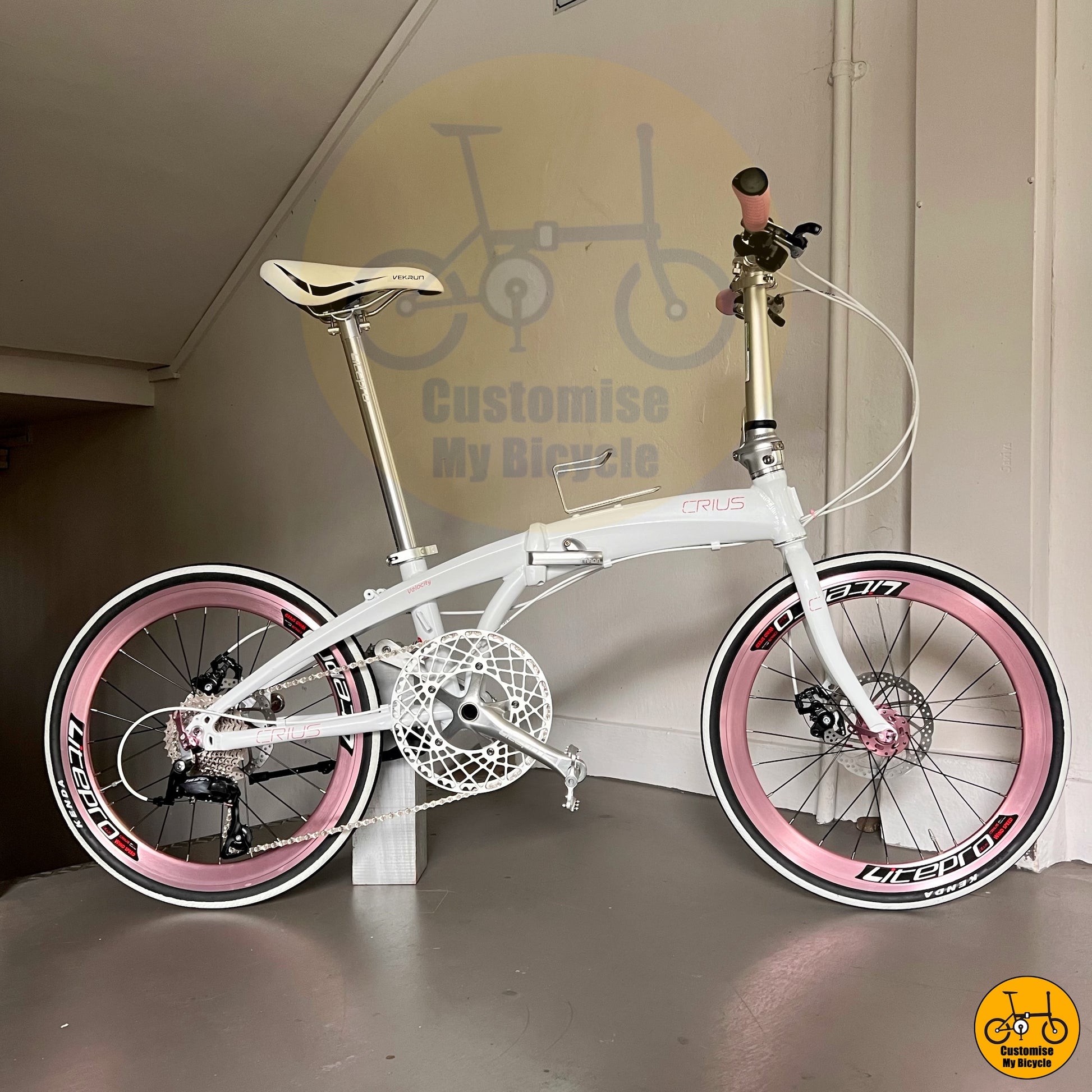 Crius Velocity 22-inch Folding Bike – Snow White Frame with Baby Pink Wheels
