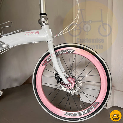 Baby pink wheels with high-performance aerodynamic rims
