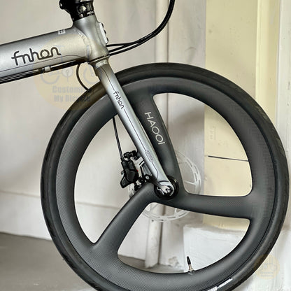 Fnhon Blast folding bike front three quarter view with Carbon Ultra Trispokes wheelset