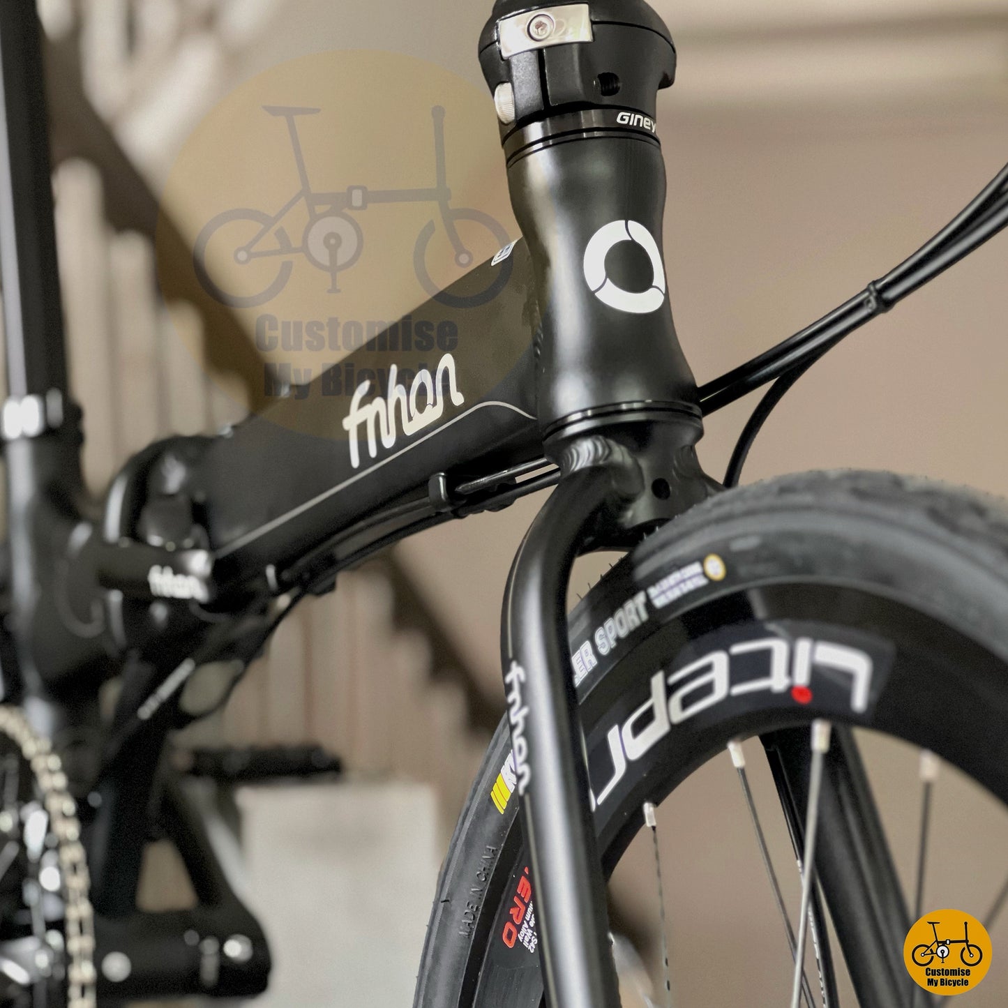 Matte black frame folding bike with 22 inch wheels
