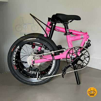 Compact folding design of Fnhon Gust 20 inch hot pink bicycle with Litepro parts
