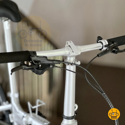 Close up of adjustable handle post folding mechanism
