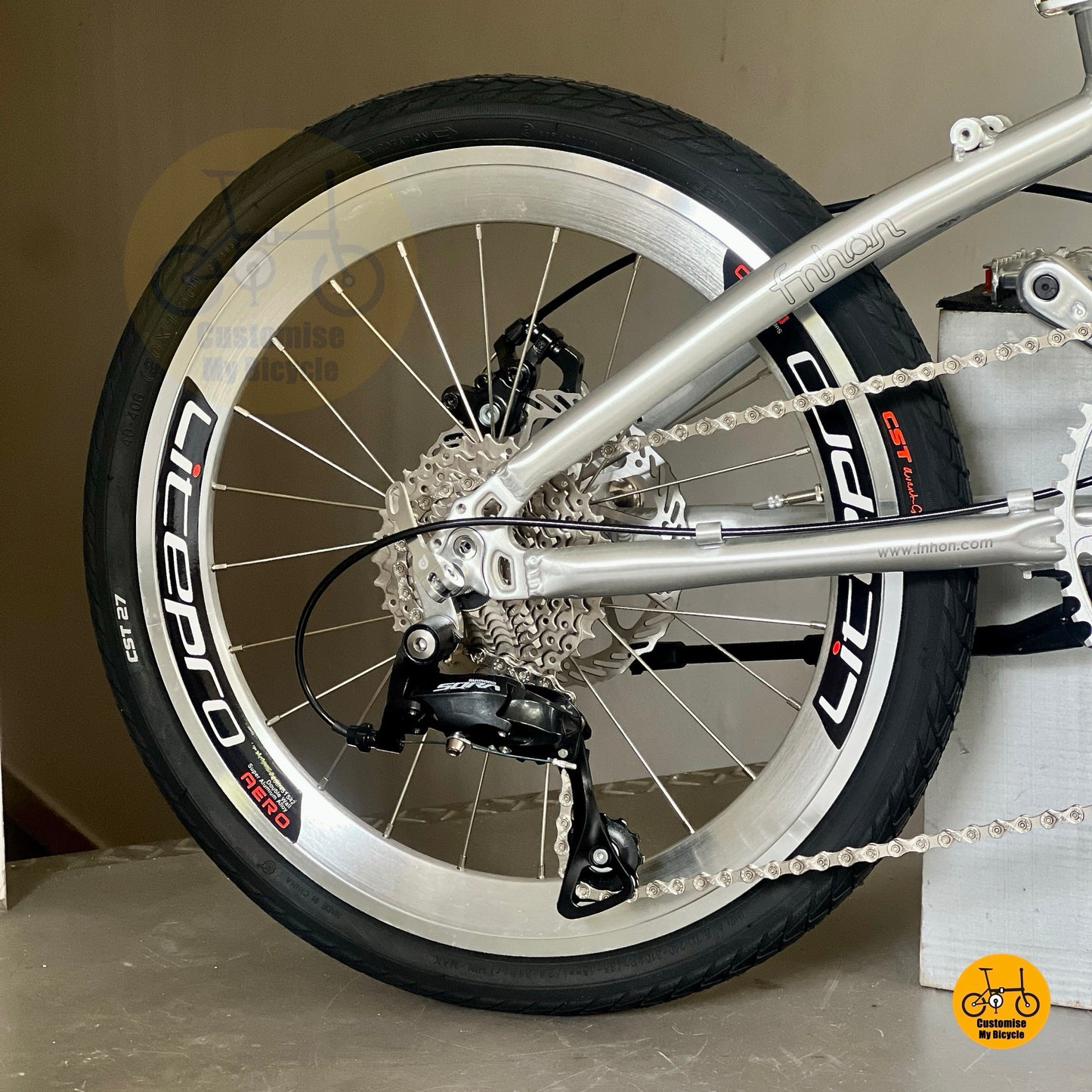 Shimano 9 gears drivetrain close up folding bike cassette and derailleur detail