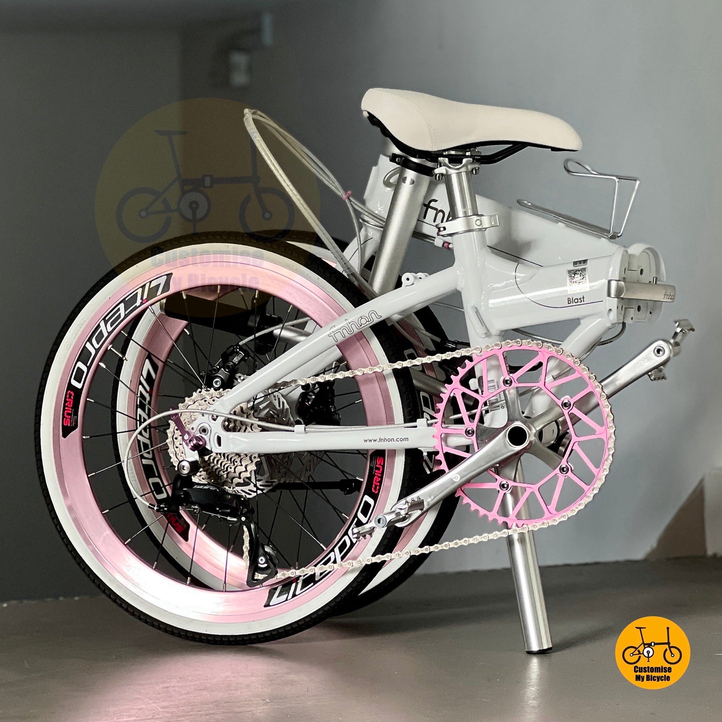 Side view of Fnhon folding bike in matte finish showing light aluminium alloy body and sleek compact folded geometry