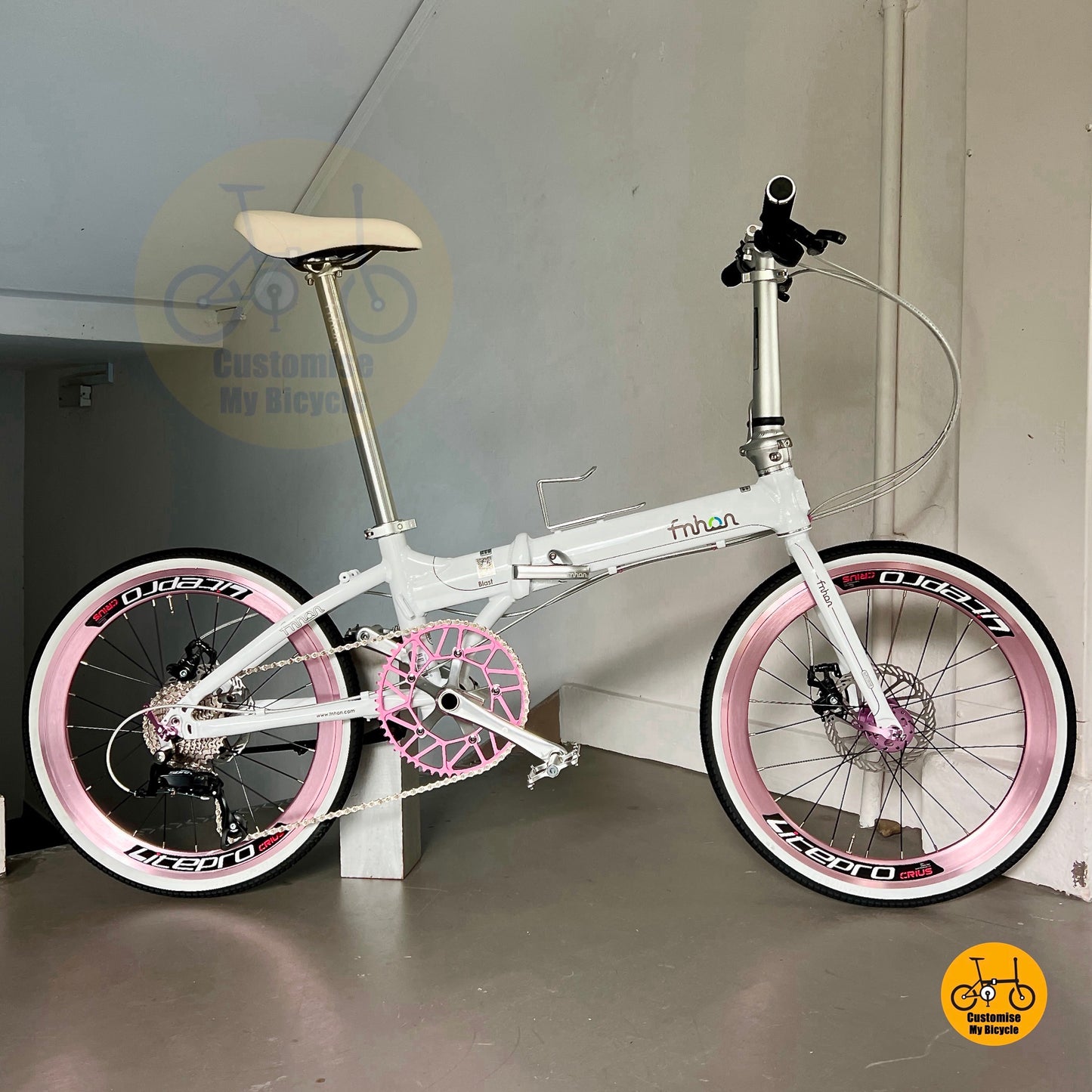 Side view of ladies favourite Fnhon folding bike in matte finish showing light aluminium alloy body and sleek compact geometry