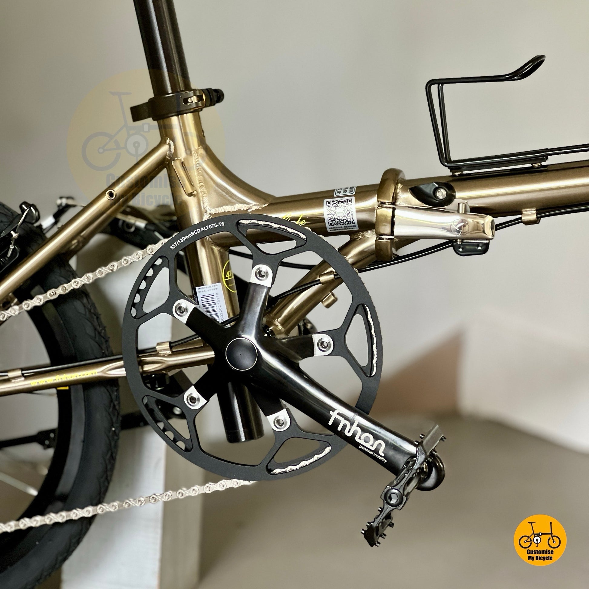 Close up of FNHON/LITEPRO Hollowtech crankset with 53t chainring with chainguard
