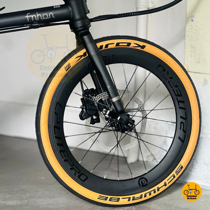 Close up Litepro aero smooth front wheel Schwalbe Kojak tan wall tyre folding bike
