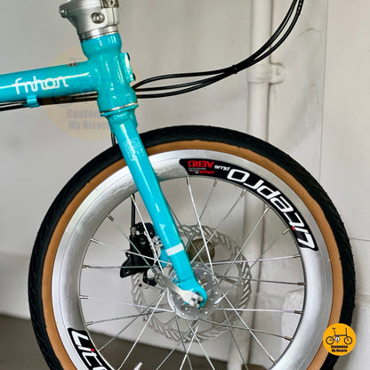 Close up of Litepro Aero high profile front wheel and Innova brown wall tyre 349 wheel size
