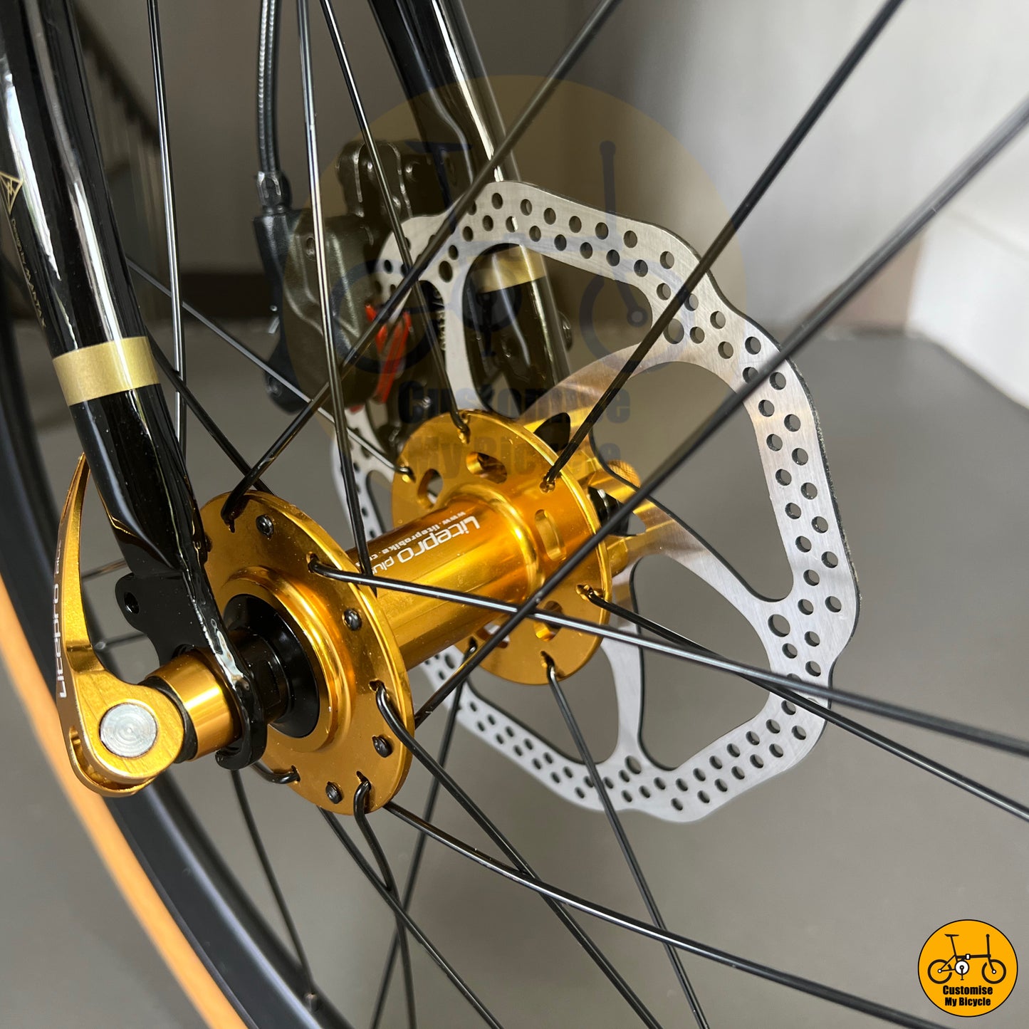 Deep sea blue folding bike with premium disc brakes for safety
