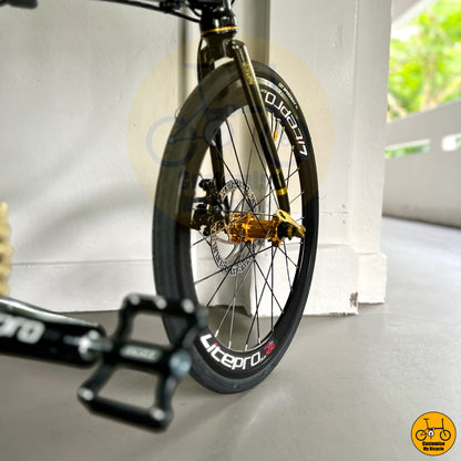 Litepro Aero black gold wheels on portable folding bike designed for city commuting and storage convenience
