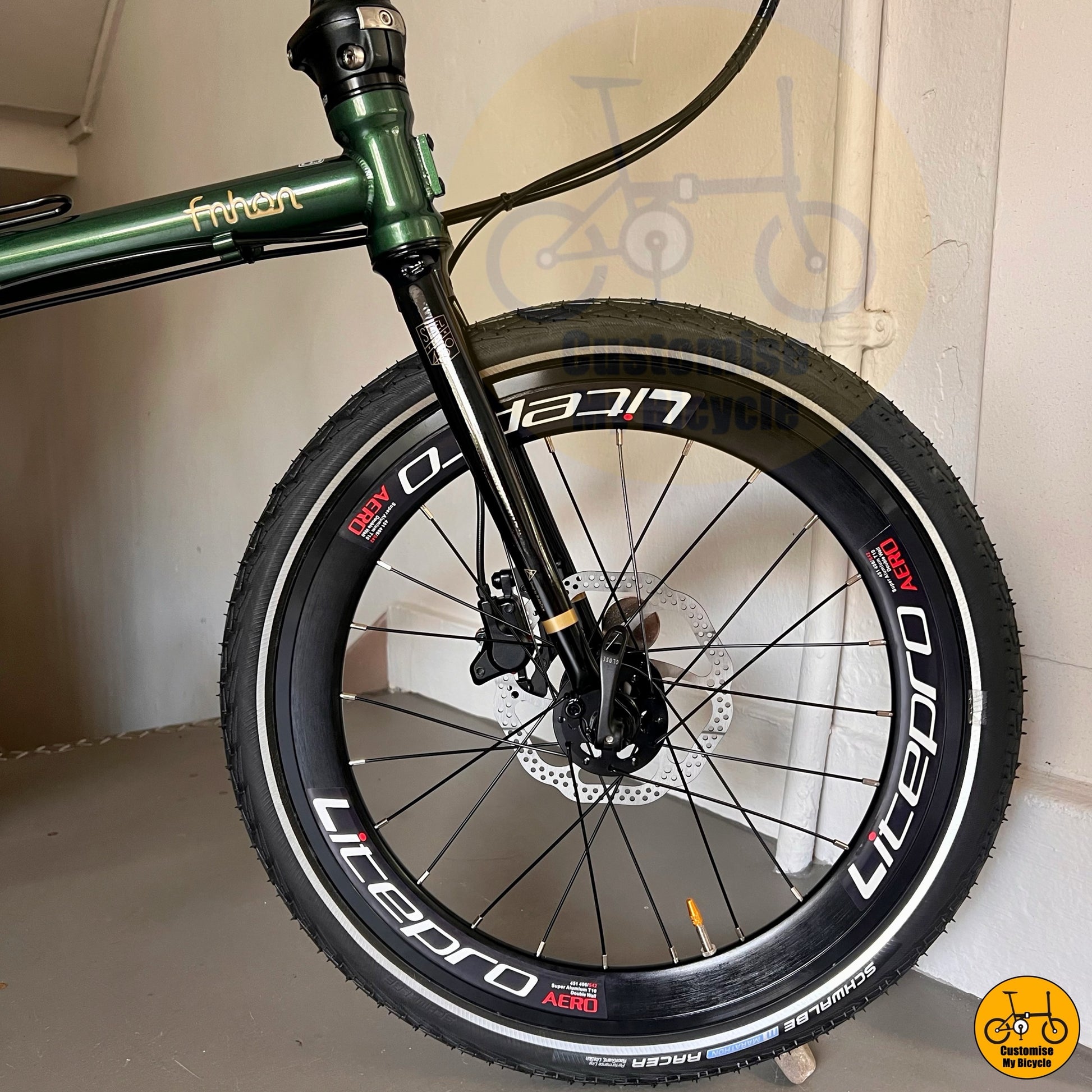 Close-up of Schwalbe Marathon tyres on folding bike  
