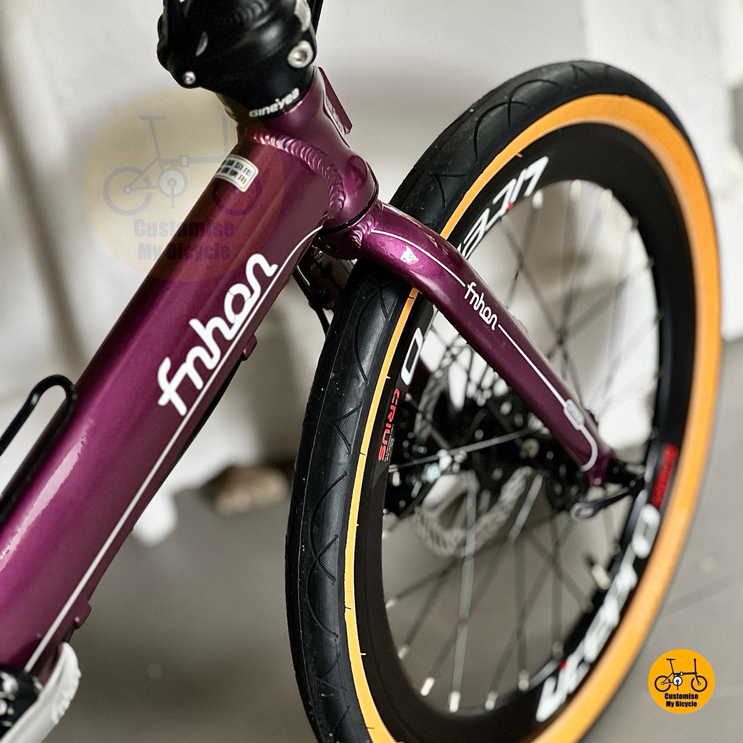 Close up of Litepro aero front wheels on Fnhon Blast Royale Purple foldable bike
