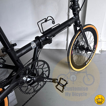 20-inch folding bike with black cockpit and components
