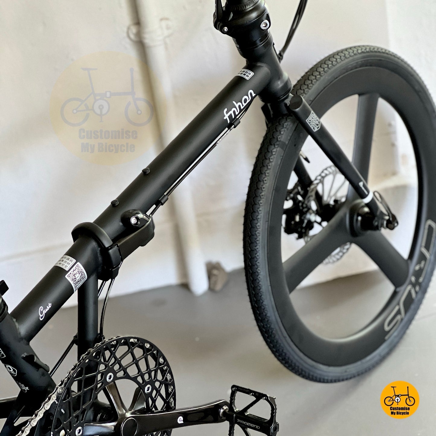 Front angle showing Crius carbon trispoke wheelset and disc brake setup
