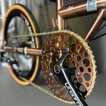 Rose gold bubble chainring on 20-inch foldable bike featuring a sleek and elegant ride experience

