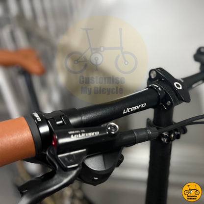 Fnhon Gust foldie with a sleek black saddle and ergonomic grips
