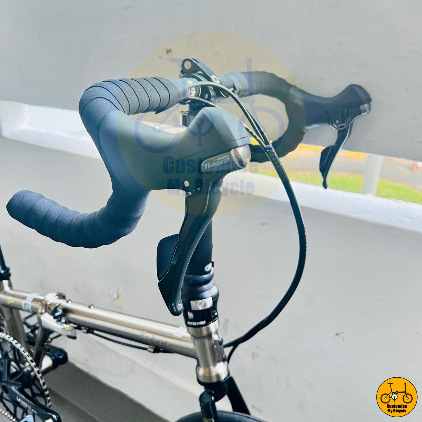 Titanium gold Fnhon Gust 20-inch folding bike with drop handlebars
