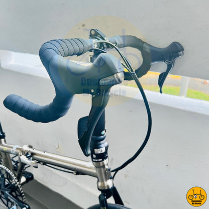 Titanium gold Fnhon Gust 20-inch folding bike with drop handlebars
