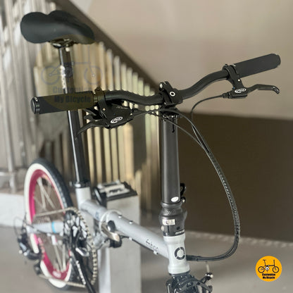 Top view showing black handlebar and Shimano Alivio M4000 shifter and Avid brake lever
