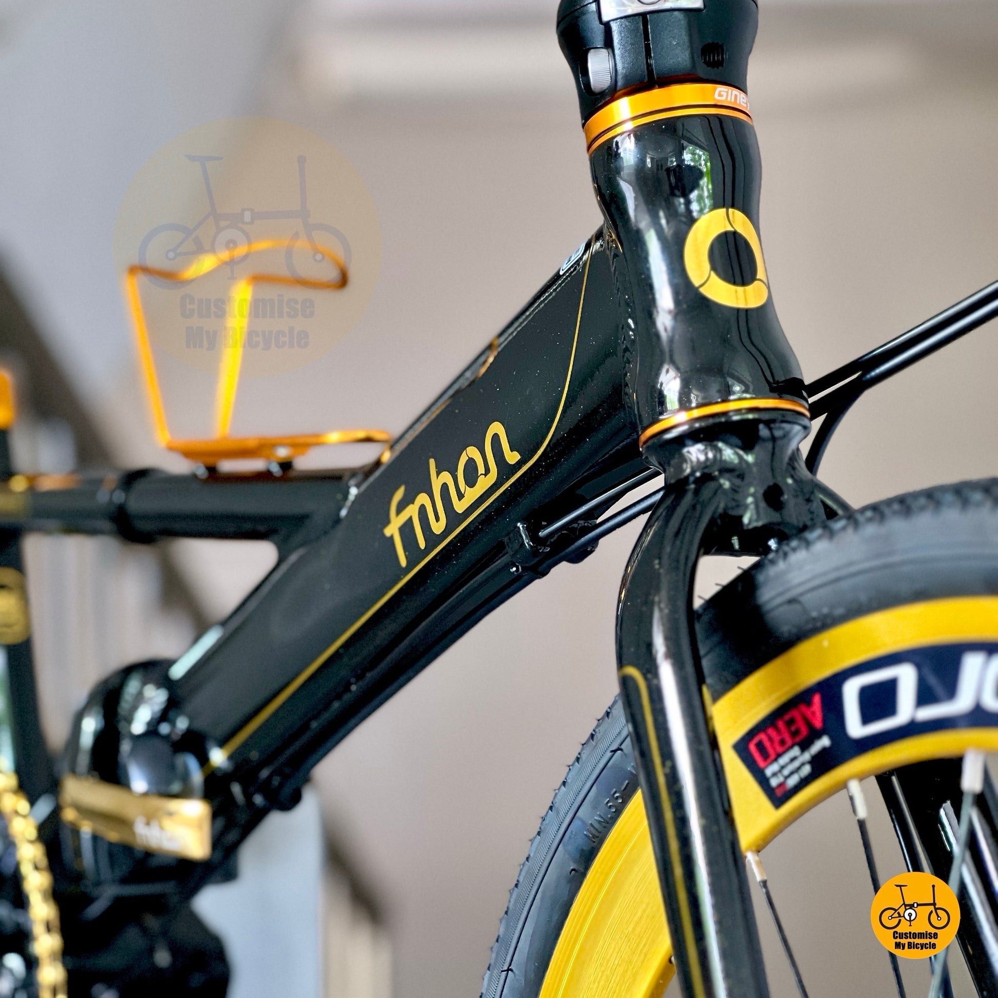 Close up of Litepro aero high profile front wheel on Fnhon Monsoon black gold
