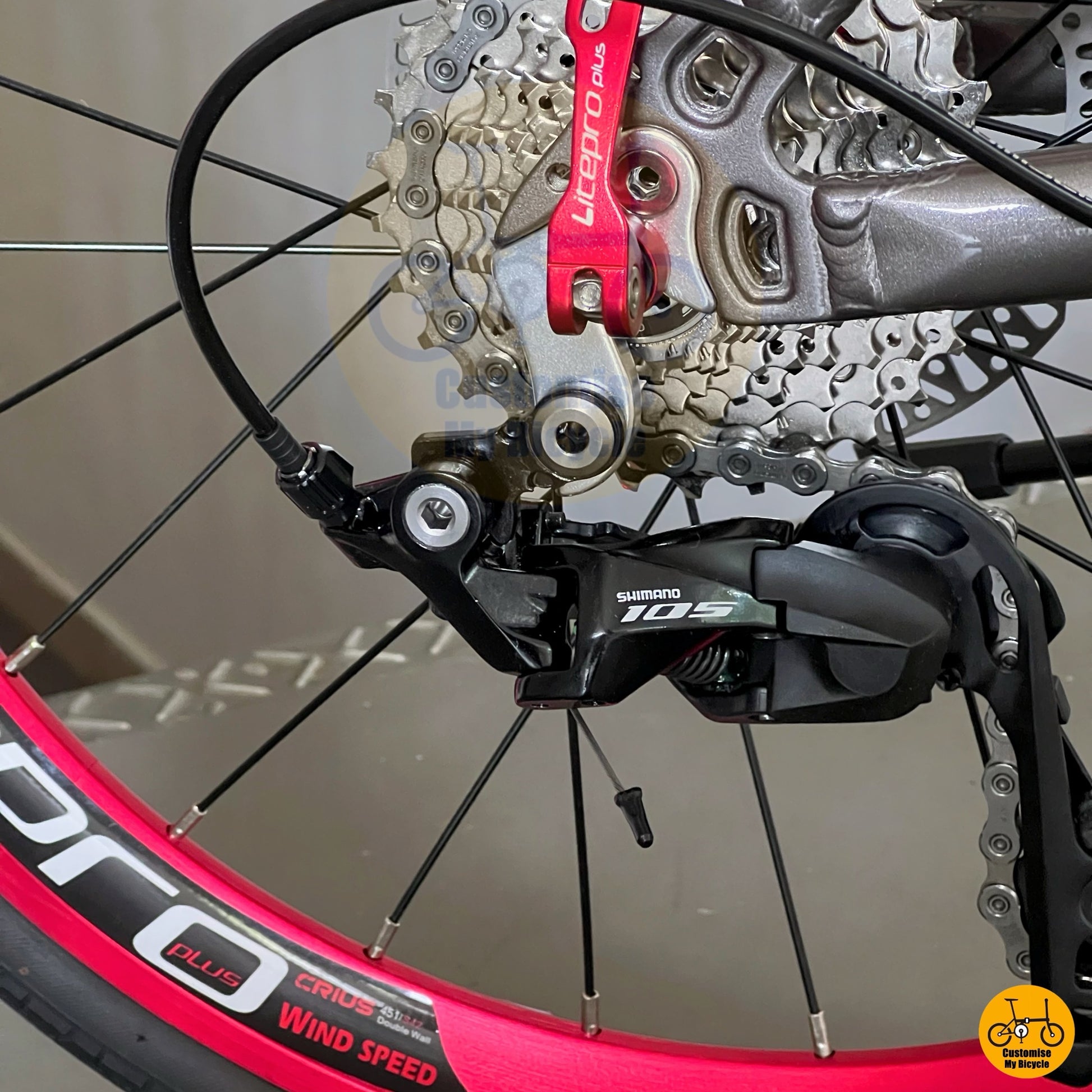 Dolphin grey Fnhon Monsoon foldable bicycle with Shimano 105 drivetrain  
