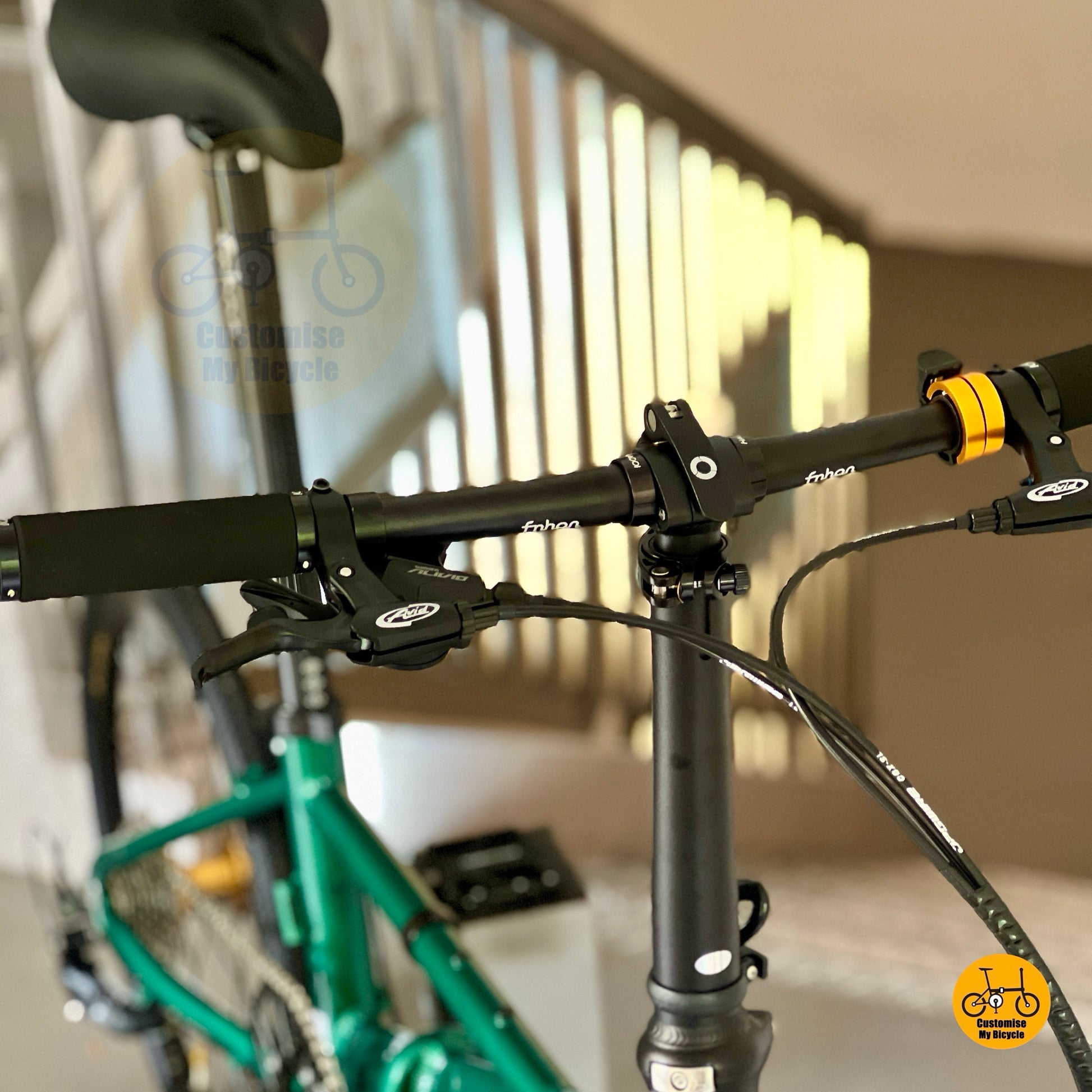 Detailed view of Fnhon adjustable handle post and seat post on Monsoon 22 inch folding bike