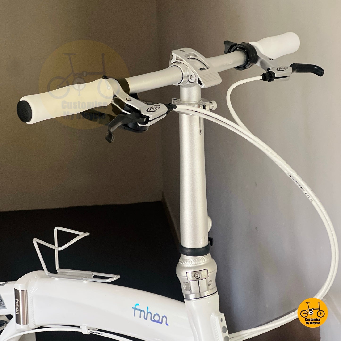 Fnhon Tornado handlepost adjustable stem folding bike cockpit detail
