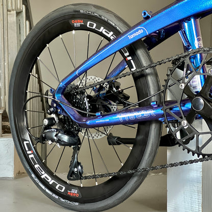 View of SUMC black chain and SHIMANO black cassette on folding bike
