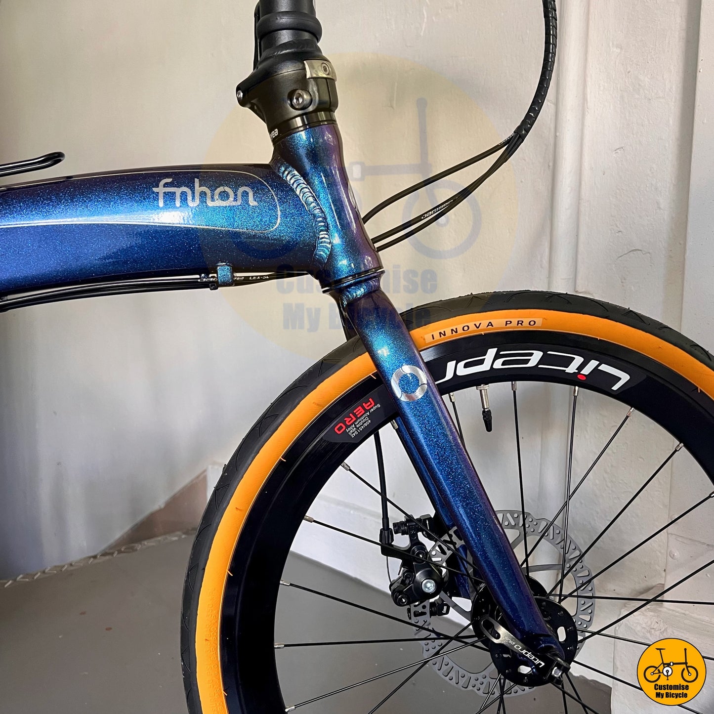 Chameleon Blue Foldie with Tan Wall Tyres – Lightweight & Stylish
