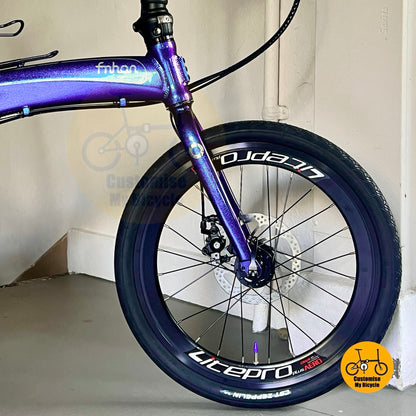 Fnhon Tornado folding bicycle front wheel close up Litepro smooth wheels Kenda CST tyres

