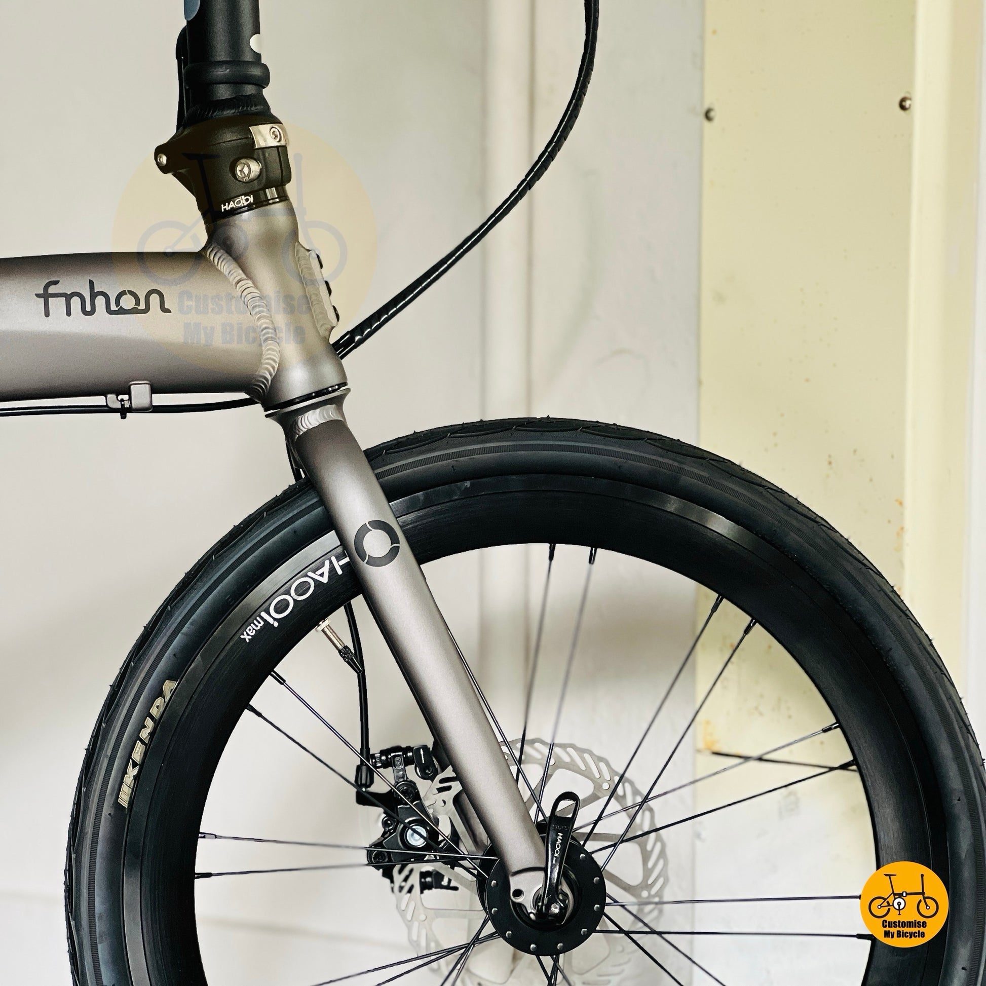 Folding bike front wheel close up HAOOI Max smooth wheels SCHWALBE Marathon heavy duty tyres
