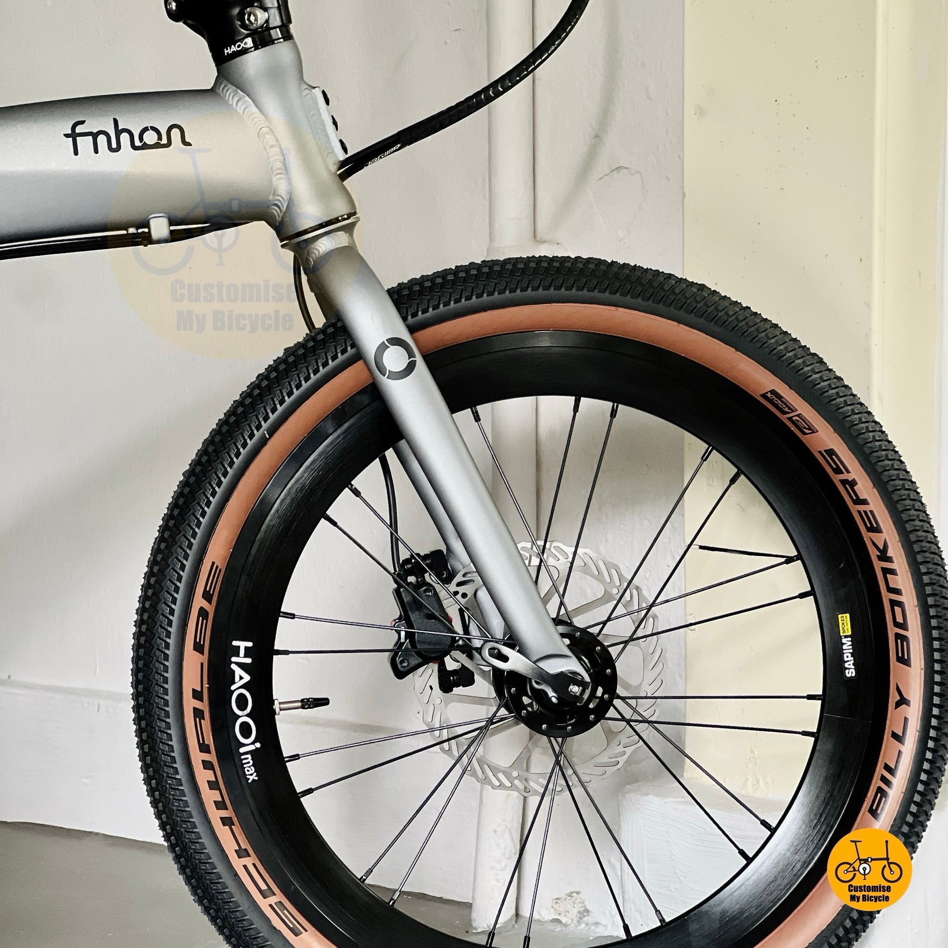 Front wheel close up HAOOI Max high wall wheel folding bike Billy Bonkers tyre detail