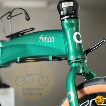 Elegant emerald green folding bike built for everyday use
