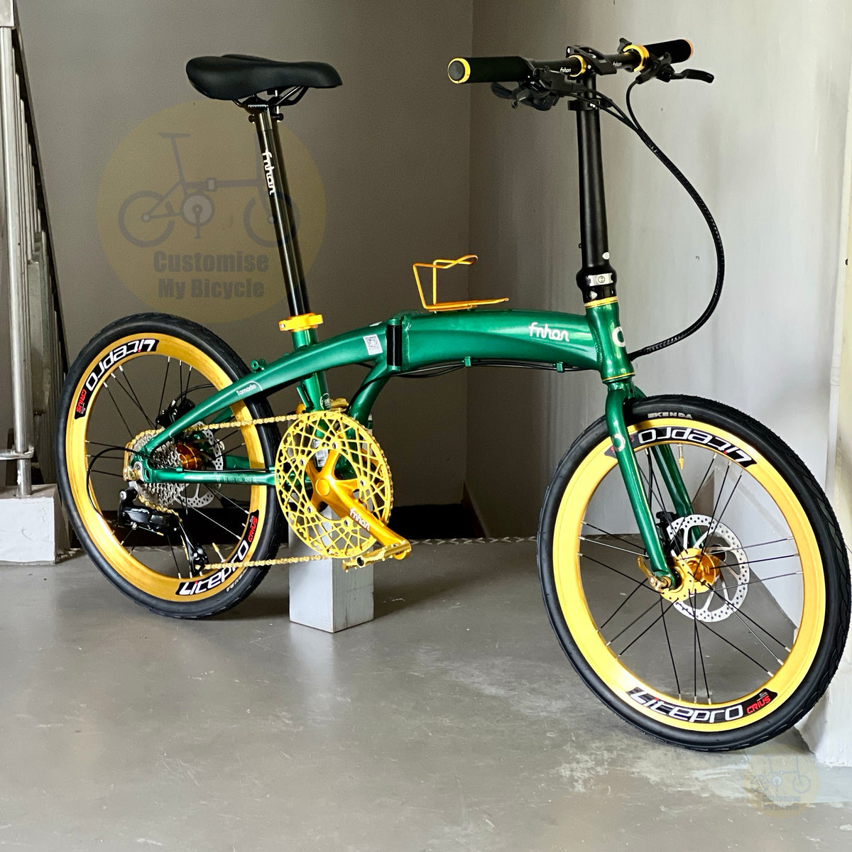 Fnhon Tornado 22 inch Emerald Green folding bicycle front three quarter view with Litepro Aero high profile wheelset