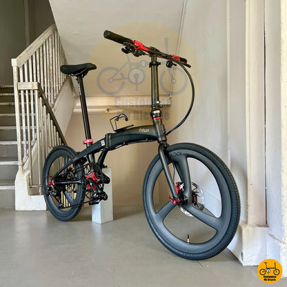 Fnhon Tornado foldable bike with premium black handlebars and red accents
