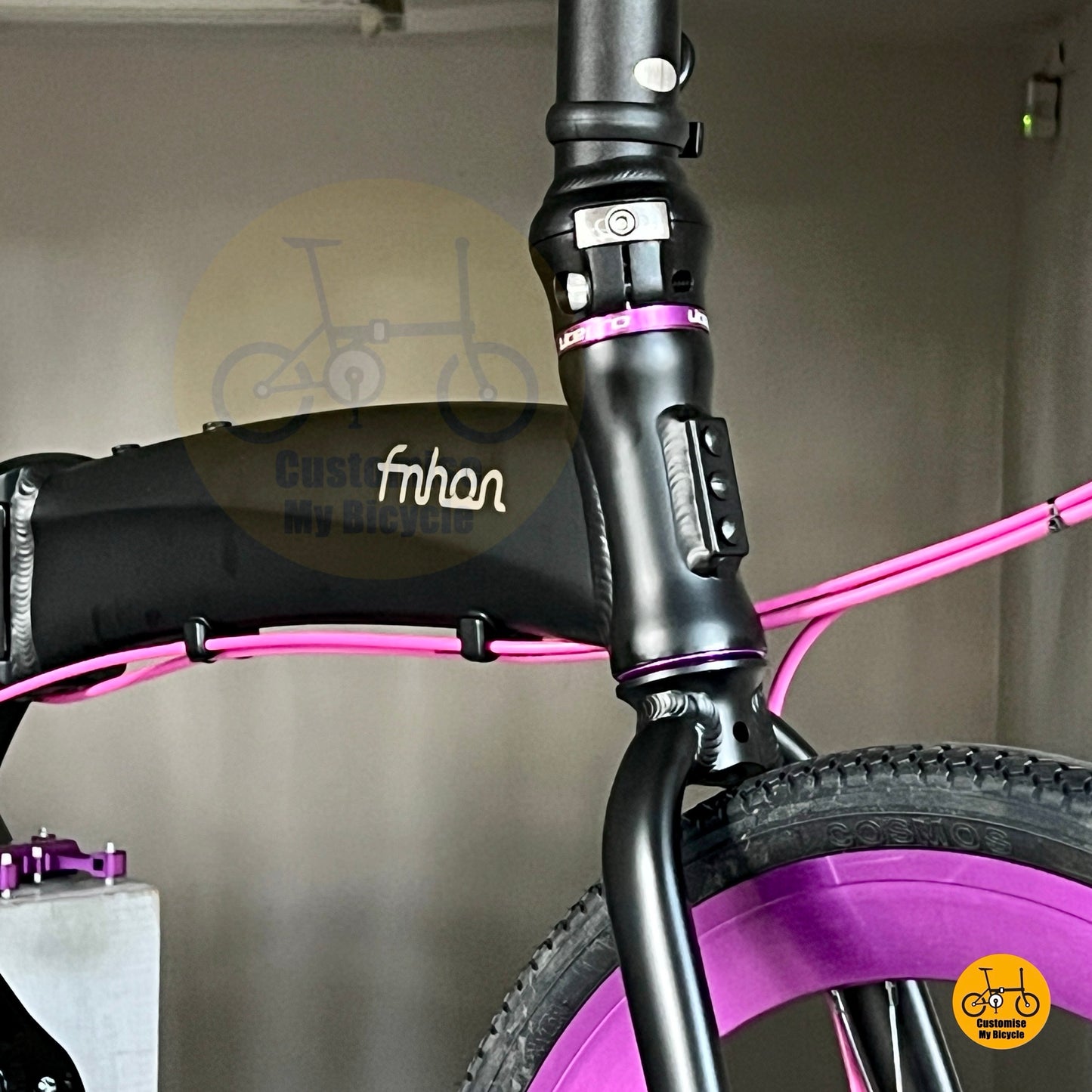 Fnhon Tornado folding bike with purple accents  
