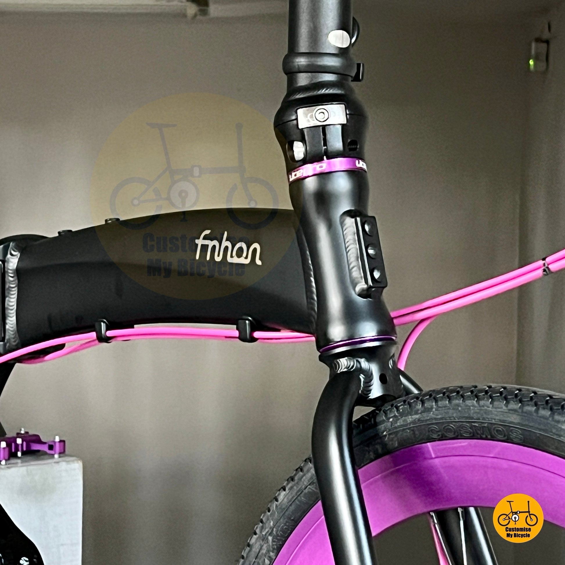 Fnhon Tornado folding bike with purple accents  
