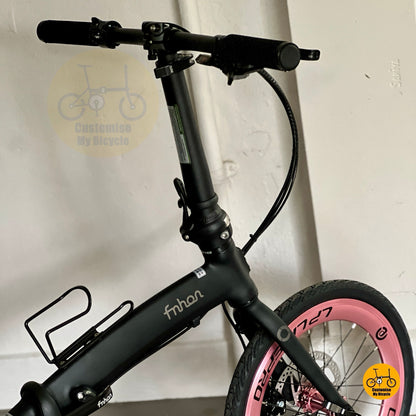 Higher front angle showing handlebar height and riding position
