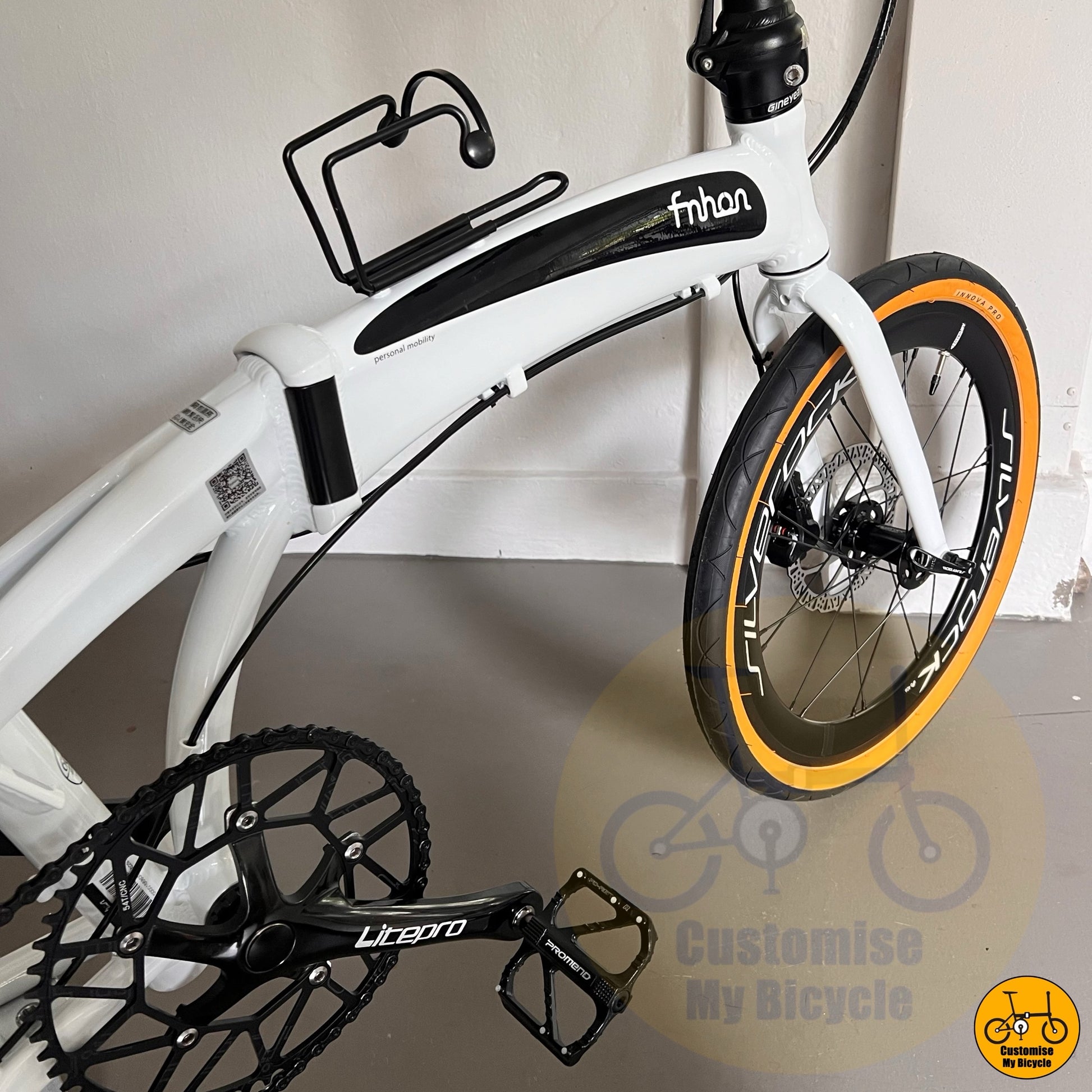 White Fnhon Tornado 20-inch folding bike with Silverock wheelset  
